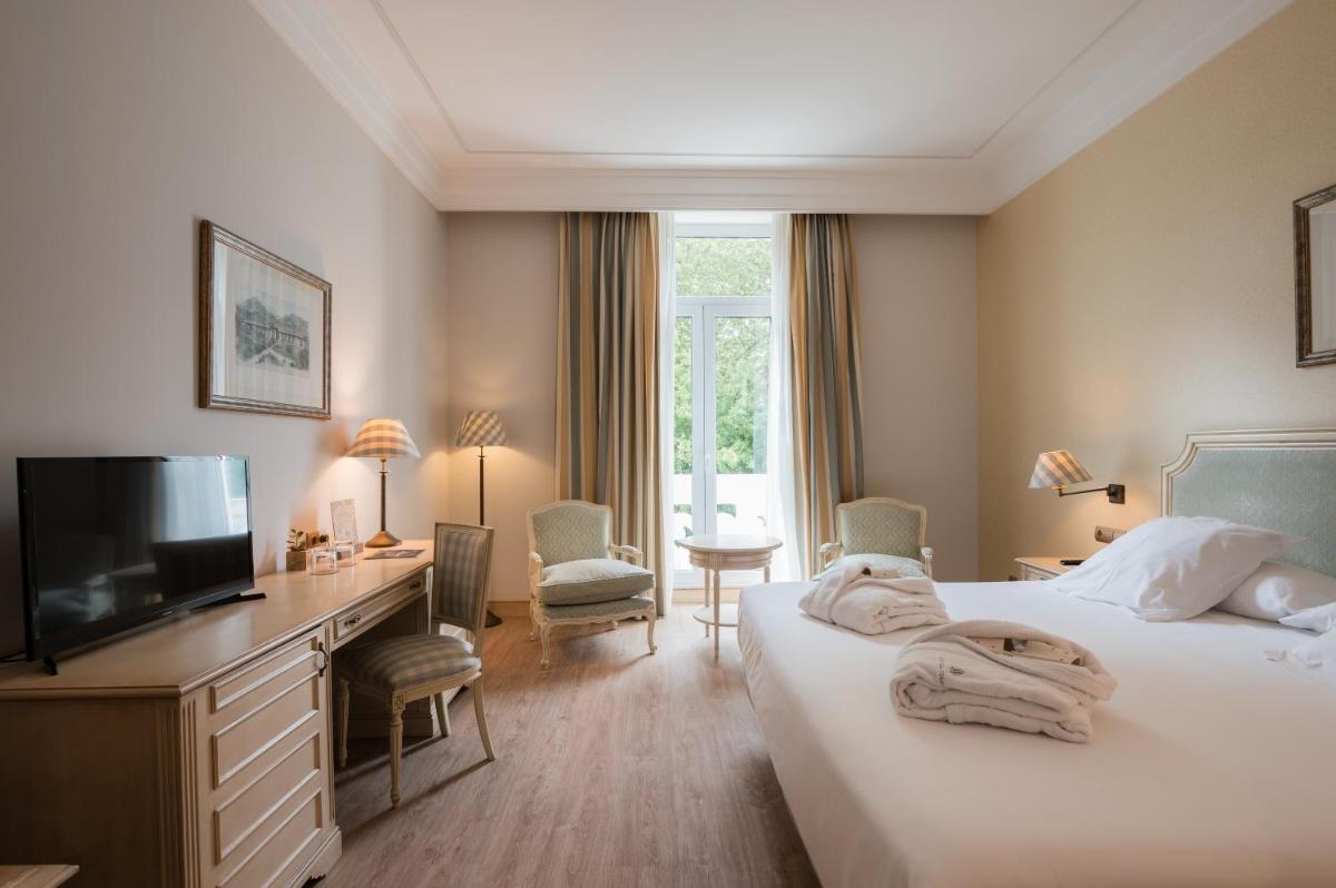 Cama o camas de una habitación en Castilla Termal Solares