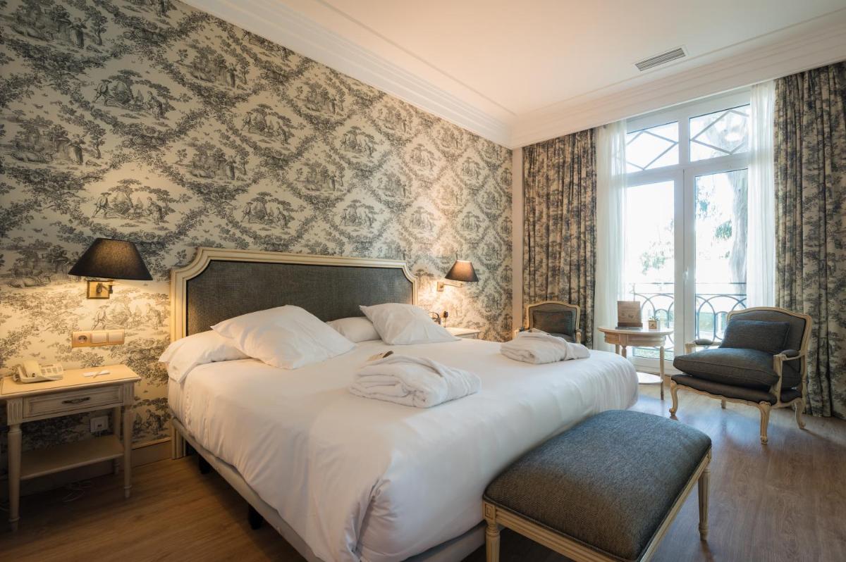 Cama o camas de una habitación en Castilla Termal Solares