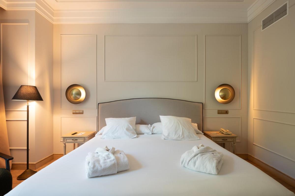 Cama o camas de una habitación en Castilla Termal Solares