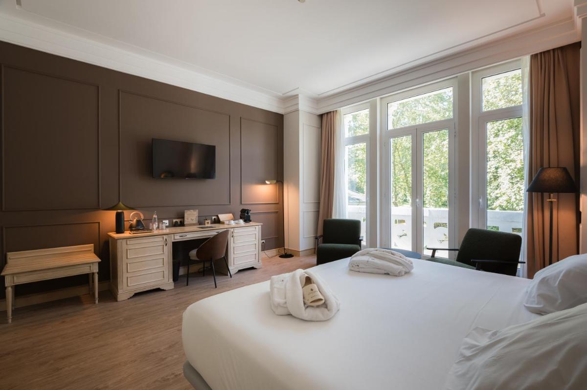 Cama o camas de una habitación en Castilla Termal Solares