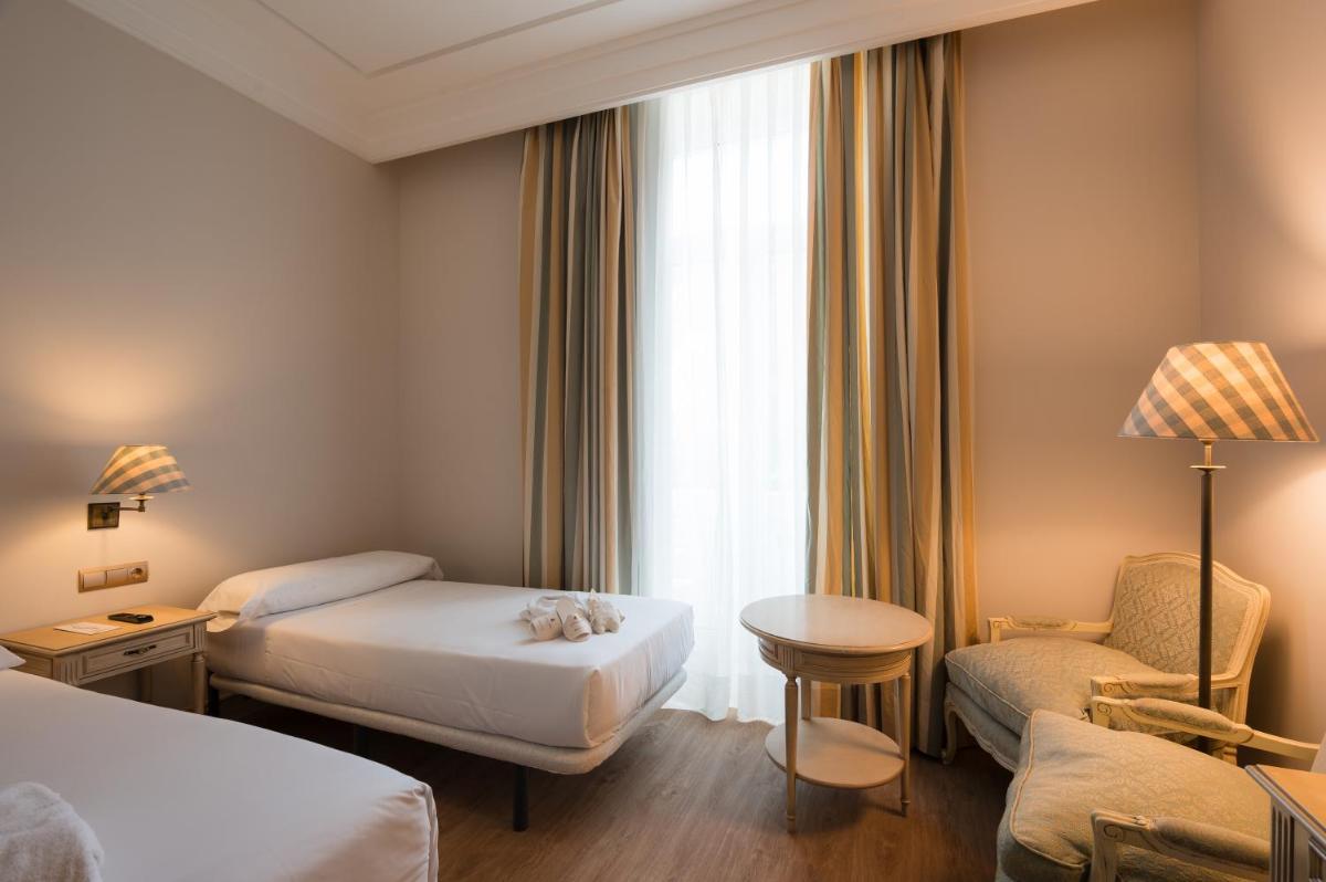 Cama o camas de una habitación en Castilla Termal Solares