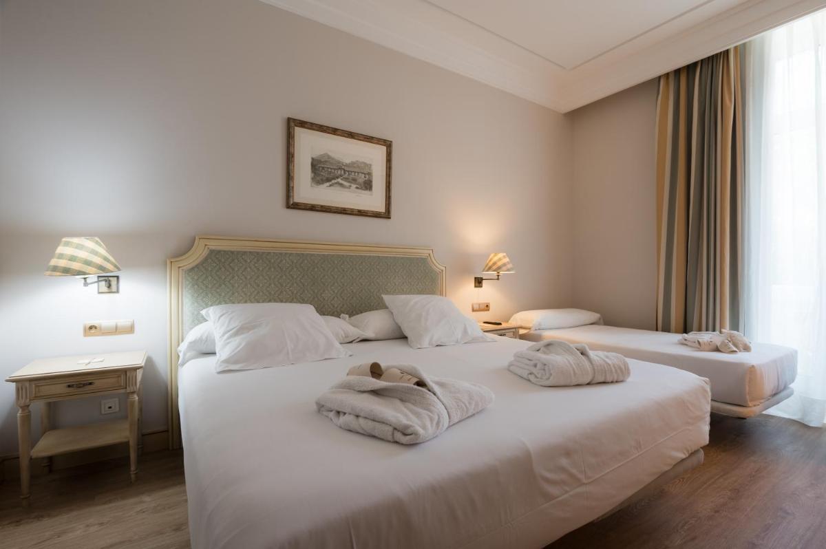 Cama o camas de una habitación en Castilla Termal Solares