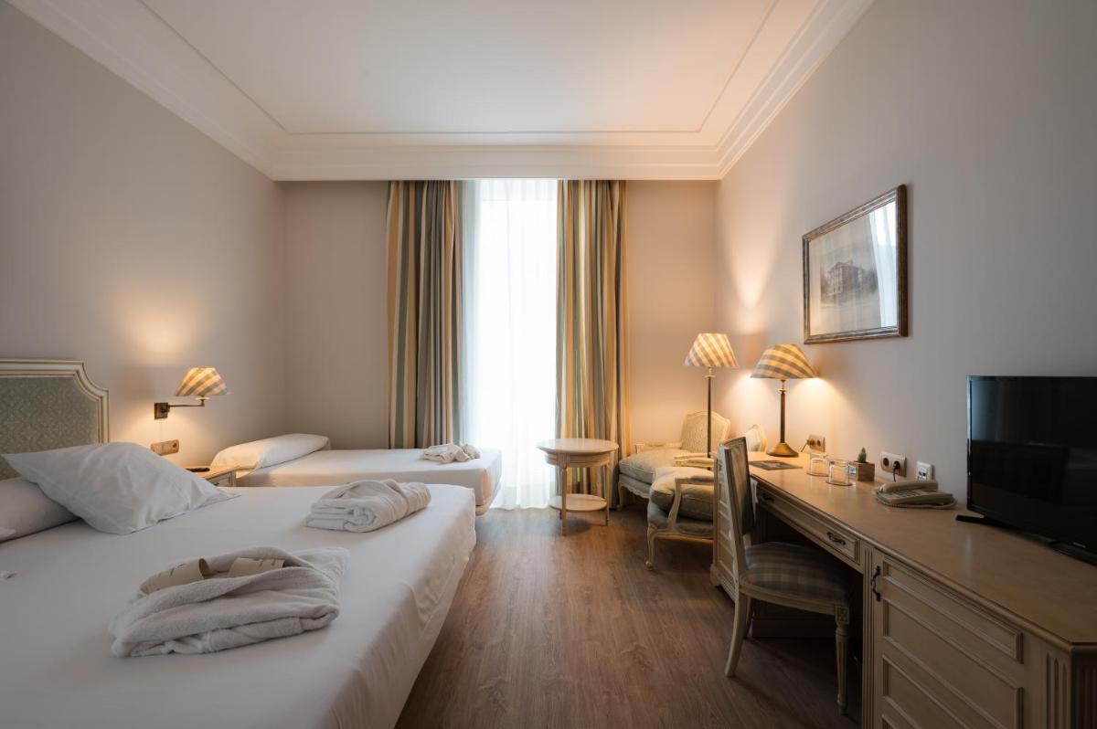 Cama o camas de una habitación en Castilla Termal Solares