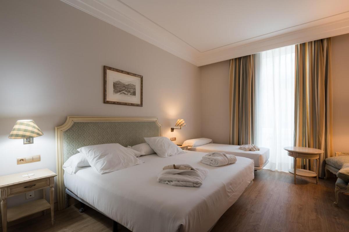 Cama o camas de una habitación en Castilla Termal Solares