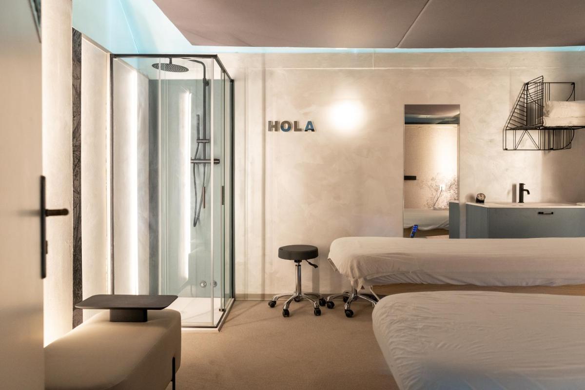 Cama o camas de una habitación en Hotel Balneario La Hermida