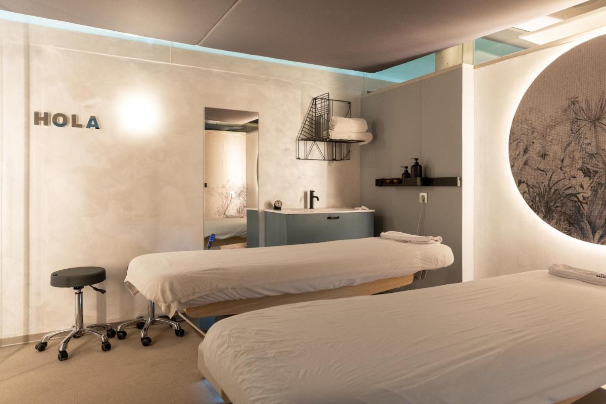 Cama o camas de una habitación en Hotel Balneario La Hermida