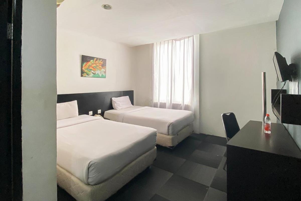 Urbanview Hotel Asyra Makassar - Hizvo