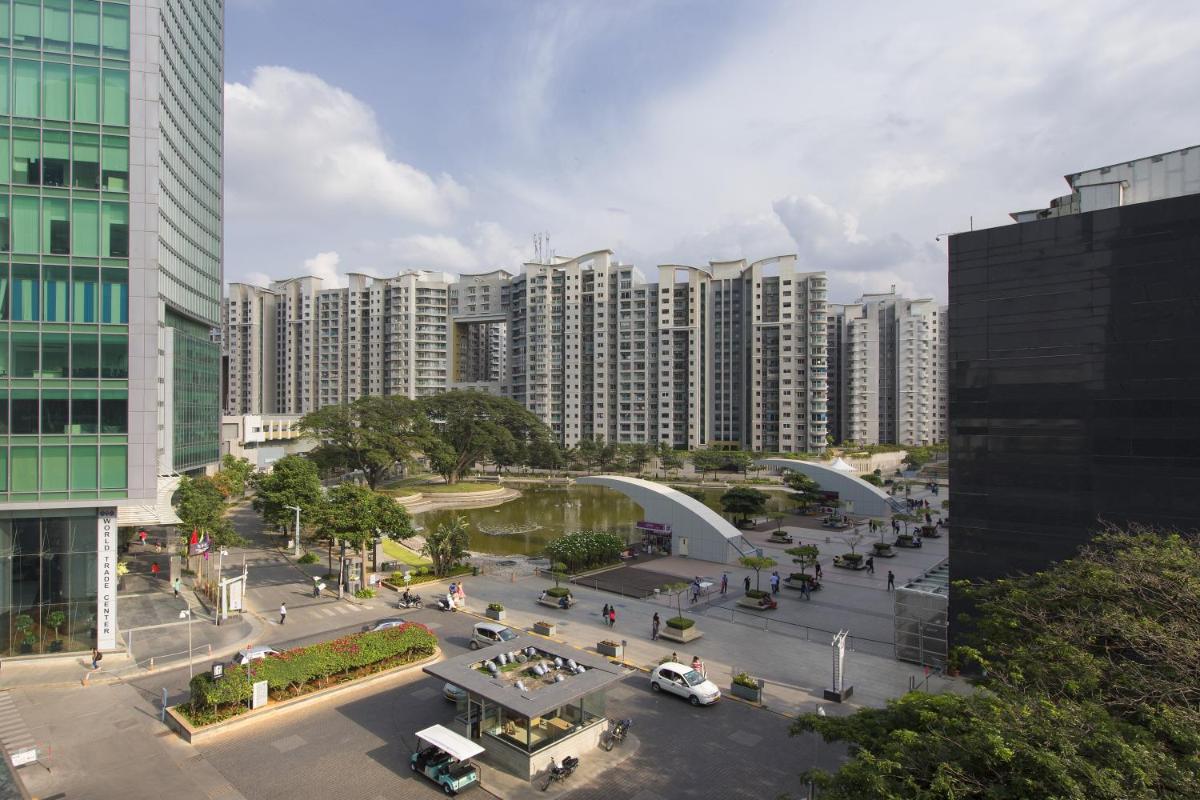 an aerial view of a city with tall buildings at Sheraton Grand Bangalore Hotel at Brigade Gateway in Bengaluru