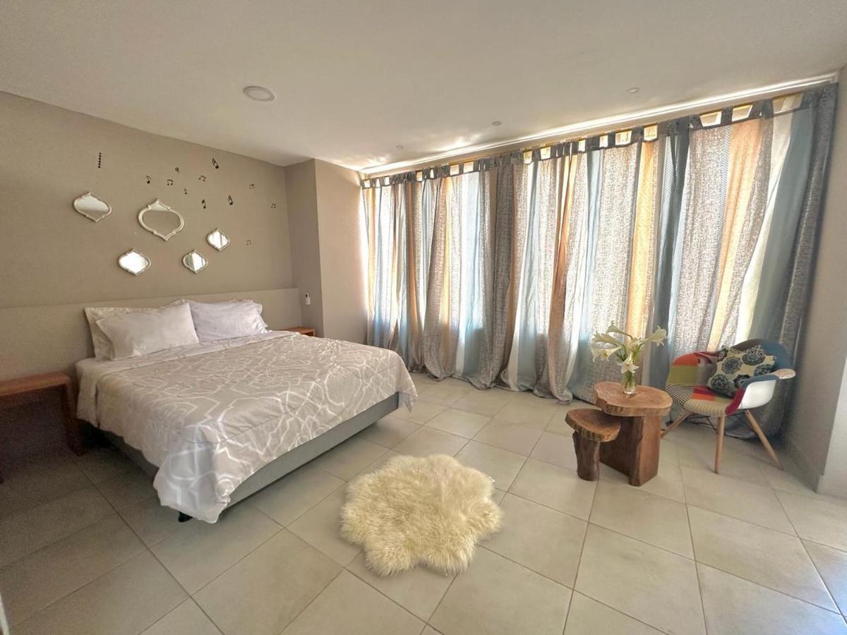 Suites Hermosas cercanas a todo - Housity