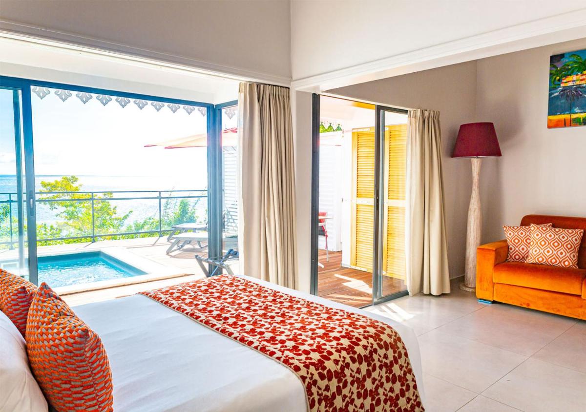 LES GALETS ROUGES LODGES & SPA - Housity