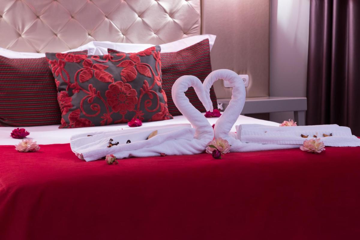 Uma cama ou camas num quarto em Hotel de Ilhavo Plaza & Spa