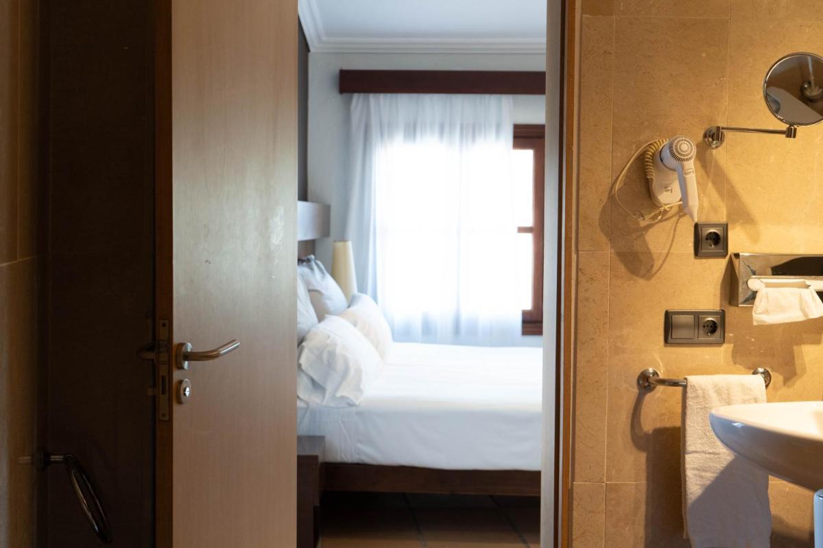 Cama o camas de una habitación en Maristel Hotel & Spa - Adults Only