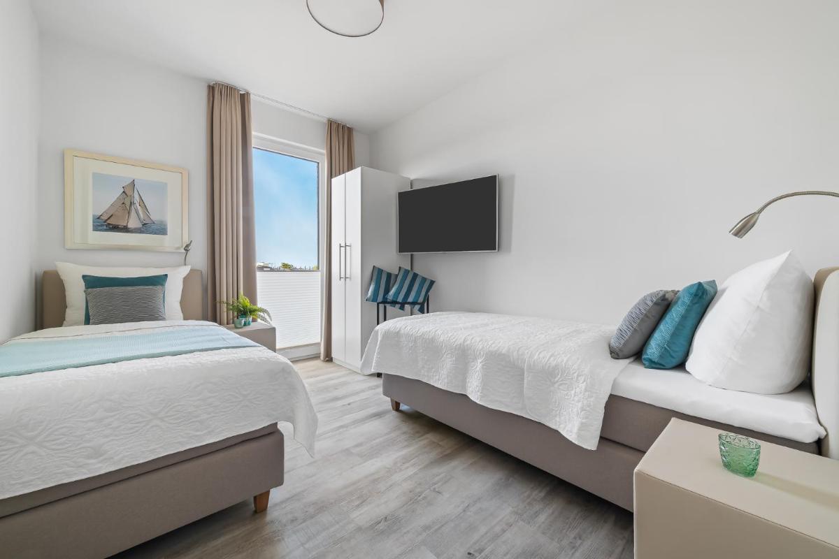 BeachTerraceThree- EG, barrierearm, Meerblick, Terrasse, Kamin, Sauna - Housity