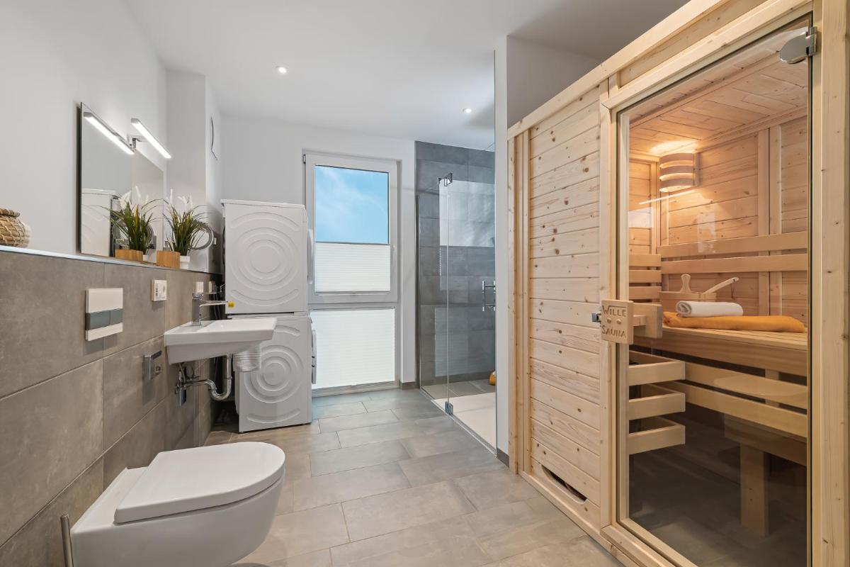 BeachTerraceThree- EG, barrierearm, Meerblick, Terrasse, Kamin, Sauna - Housity