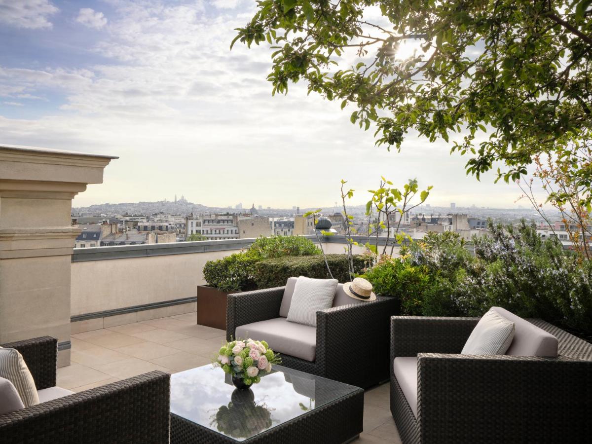 Coin salon dans l'établissement The Peninsula Paris