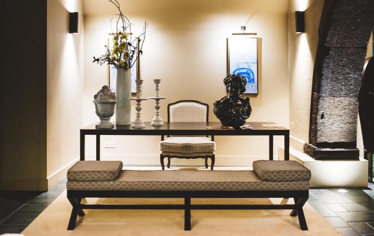 Uma área de estar em Castanheiro Boutique Hotel