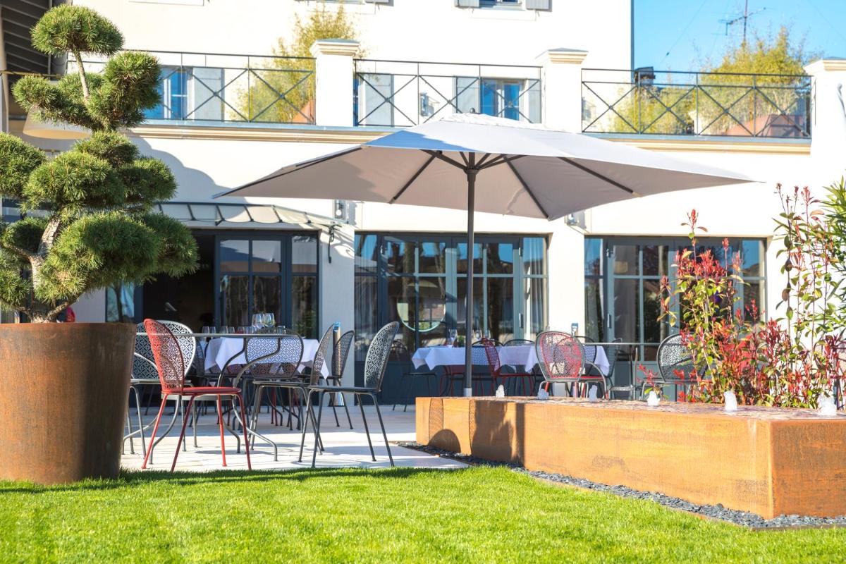 Restaurant ou autre lieu de restauration dans l'établissement Hotel Clos Castel Villas Spa