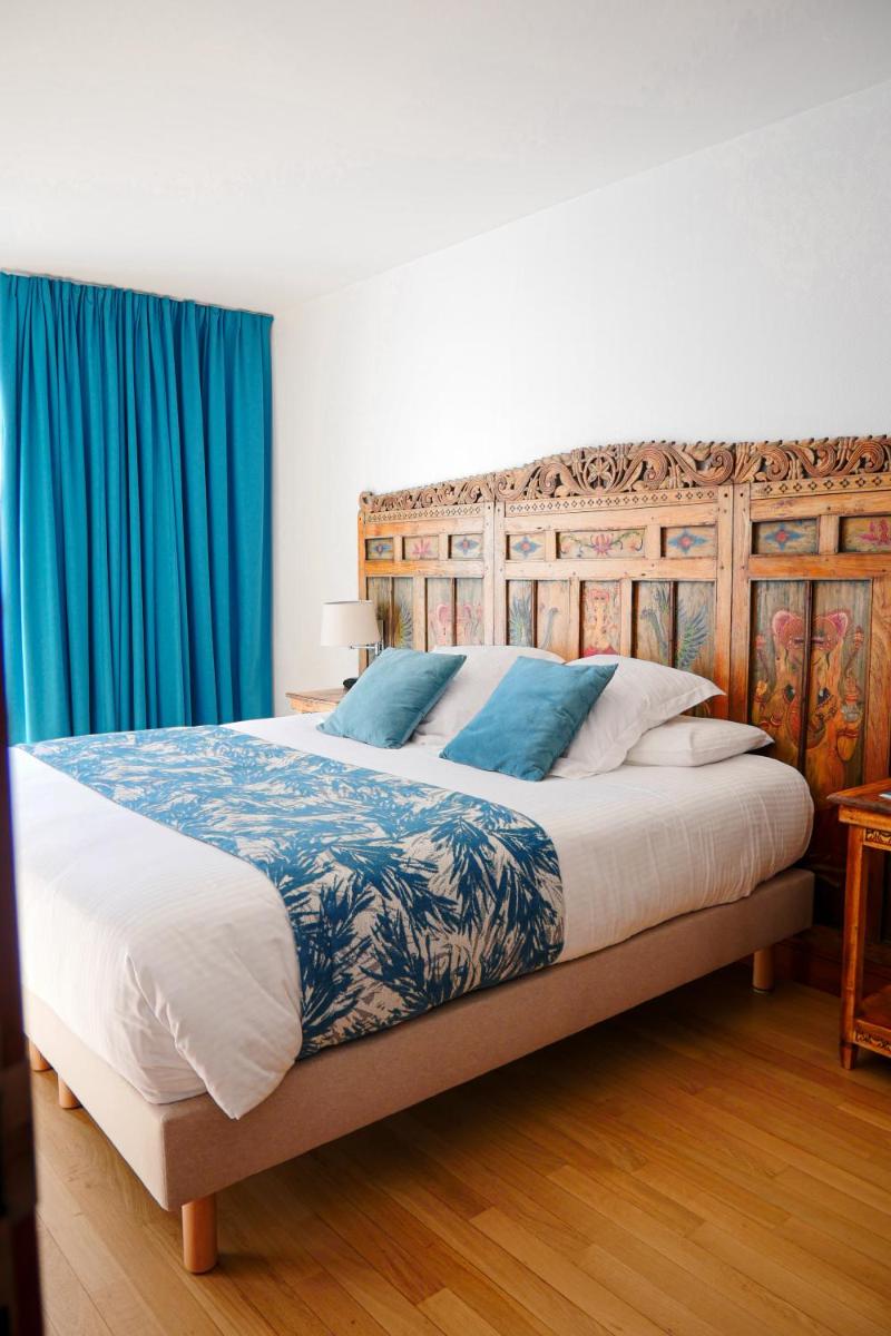Un ou plusieurs lits dans un hébergement de l'établissement Villa Kerasy Hotel Spa