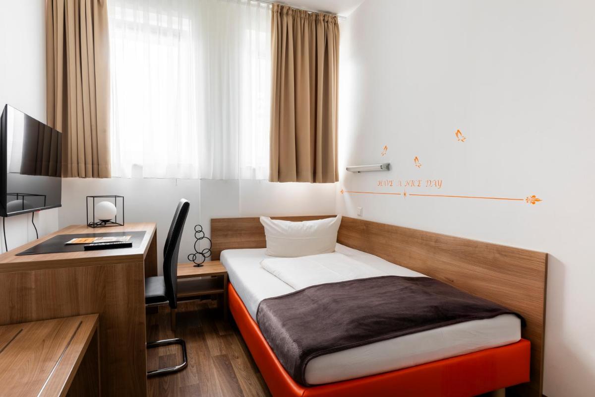 Orange Hotel und Apartments - Housity