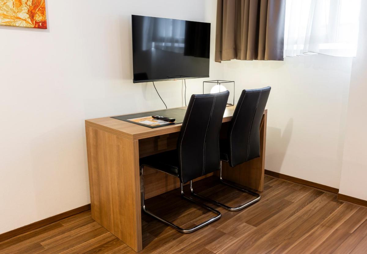 Orange Hotel und Apartments - Housity