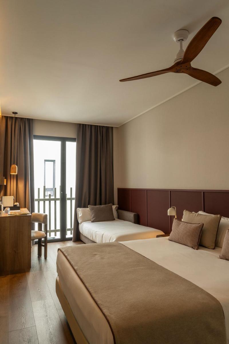 Cama o camas de una habitación en Hotel Well and Come Málaga