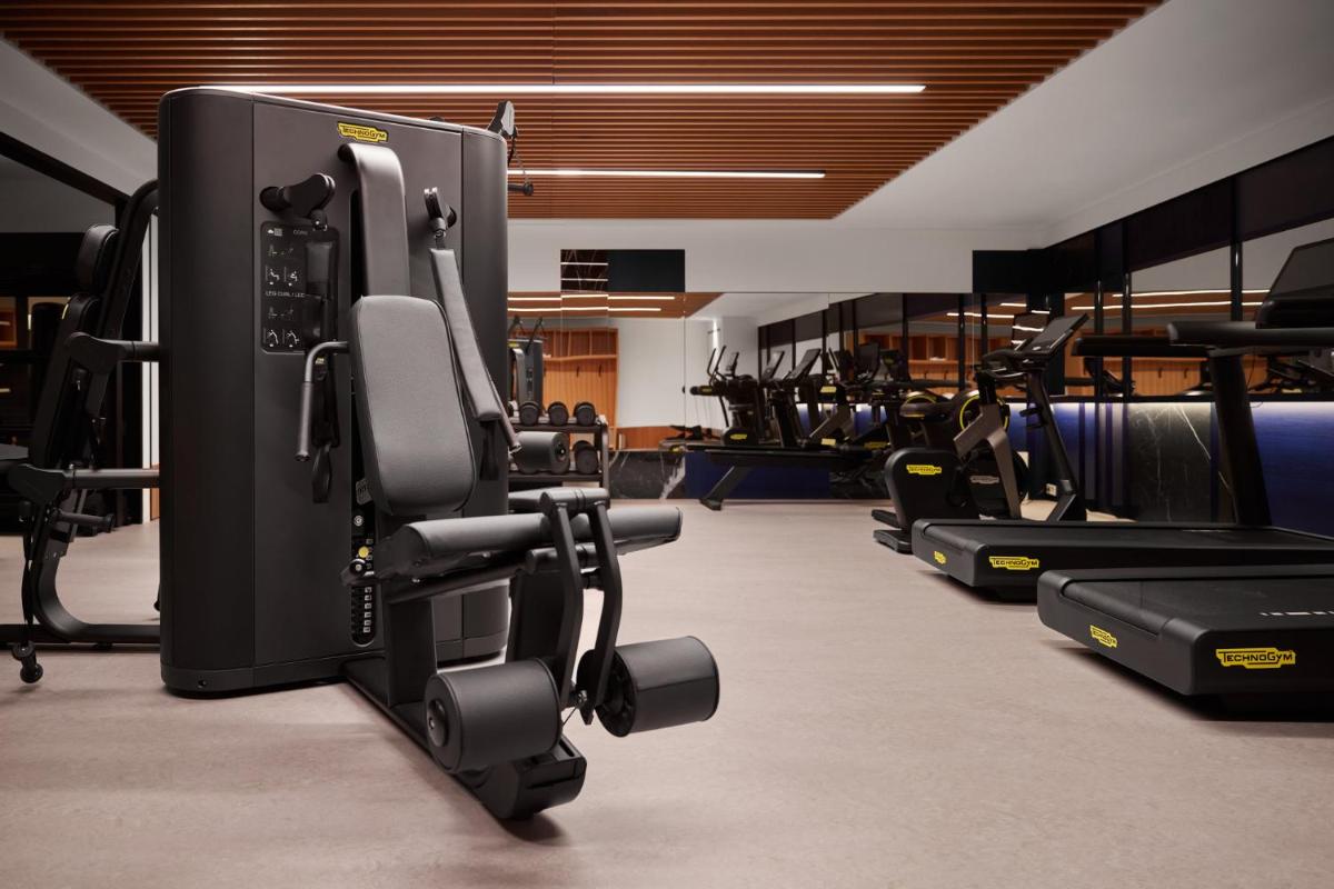 Das Fitnesscenter und/oder die Fitnesseinrichtungen in der Unterkunft Kimpton Main Frankfurt by IHG