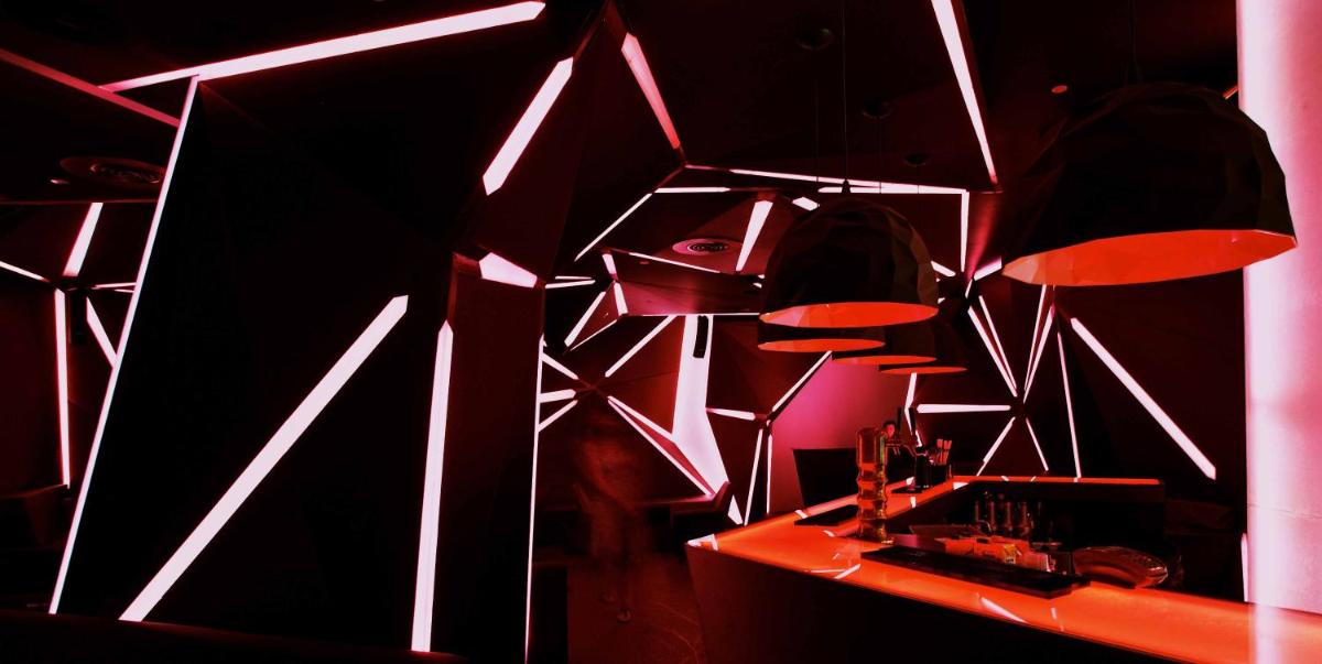 a room with a table with red lights on it at The Park Hyderabad, Banjara Hills near Hussain Sagar Lake in Hyderabad a room with a table with red lights on it at The Park Hyderabad, Banjara Hills near Hussain Sagar Lake in Hyderabad