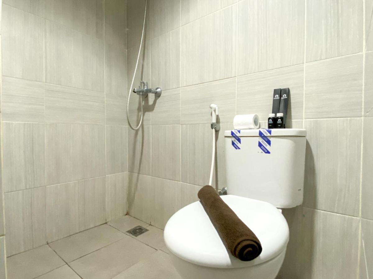 Modern Look and Warm Studio at Vasanta Innopark Apartment By Travelio - Housity