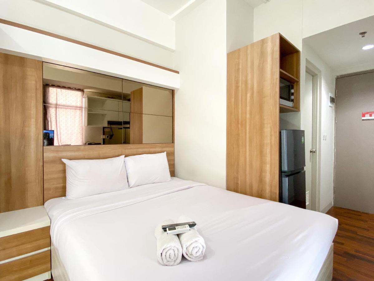Modern Look and Warm Studio at Vasanta Innopark Apartment By Travelio - Housity