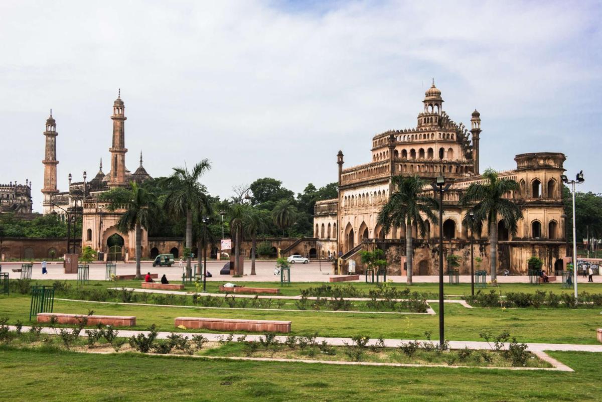 a building with a park in front of it at Hyatt Regency Lucknow Gomti Nagar in Lucknow