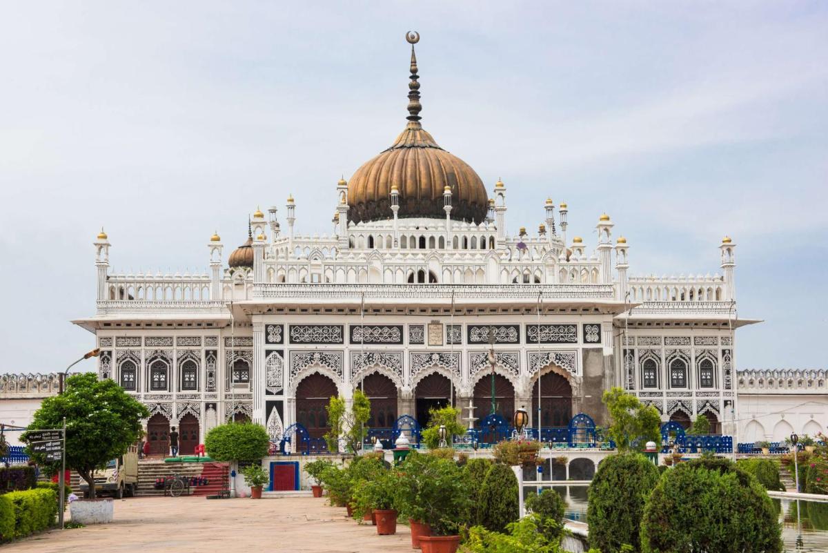 a large white building with a dome on top at Hyatt Regency Lucknow Gomti Nagar in Lucknow