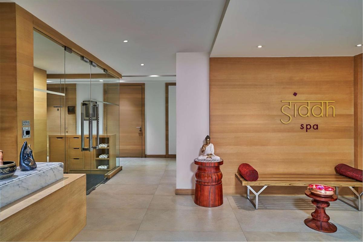 a store lobby with a sign on the wall at Hyatt Regency Lucknow Gomti Nagar in Lucknow