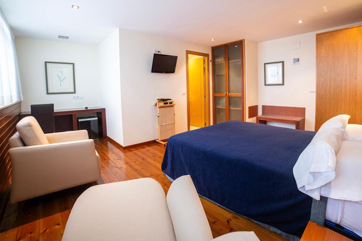 Zona de estar de Hotel Auditorio Santiago & Spa