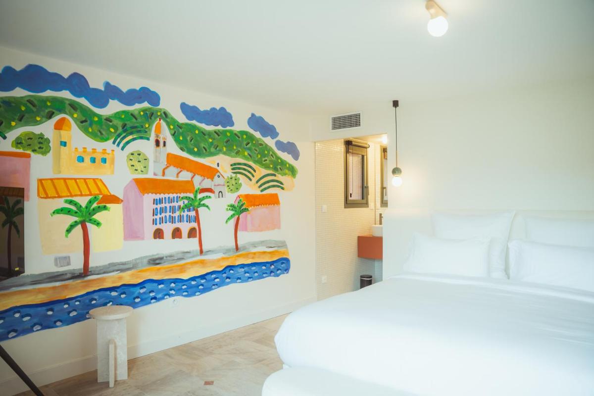 Un ou plusieurs lits dans un hébergement de l'établissement Maison Nova - Boutique Hôtel & Spa