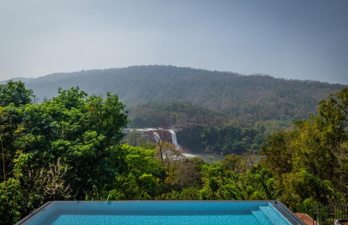 Flora Misty Falls Athirappilly - Housity