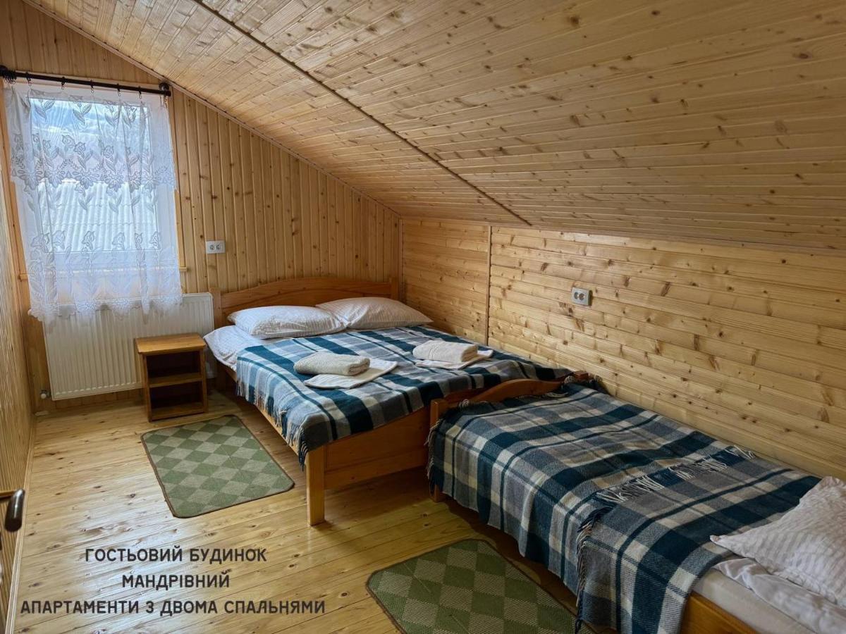 Guest House Mandrivnyi Rooms&Apartments - Housity