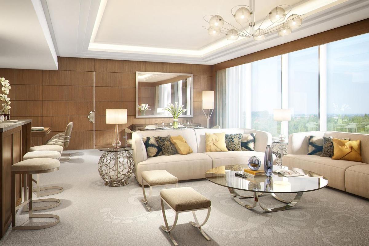 a living room with a couch and a table at The St. Regis Mumbai in Mumbai