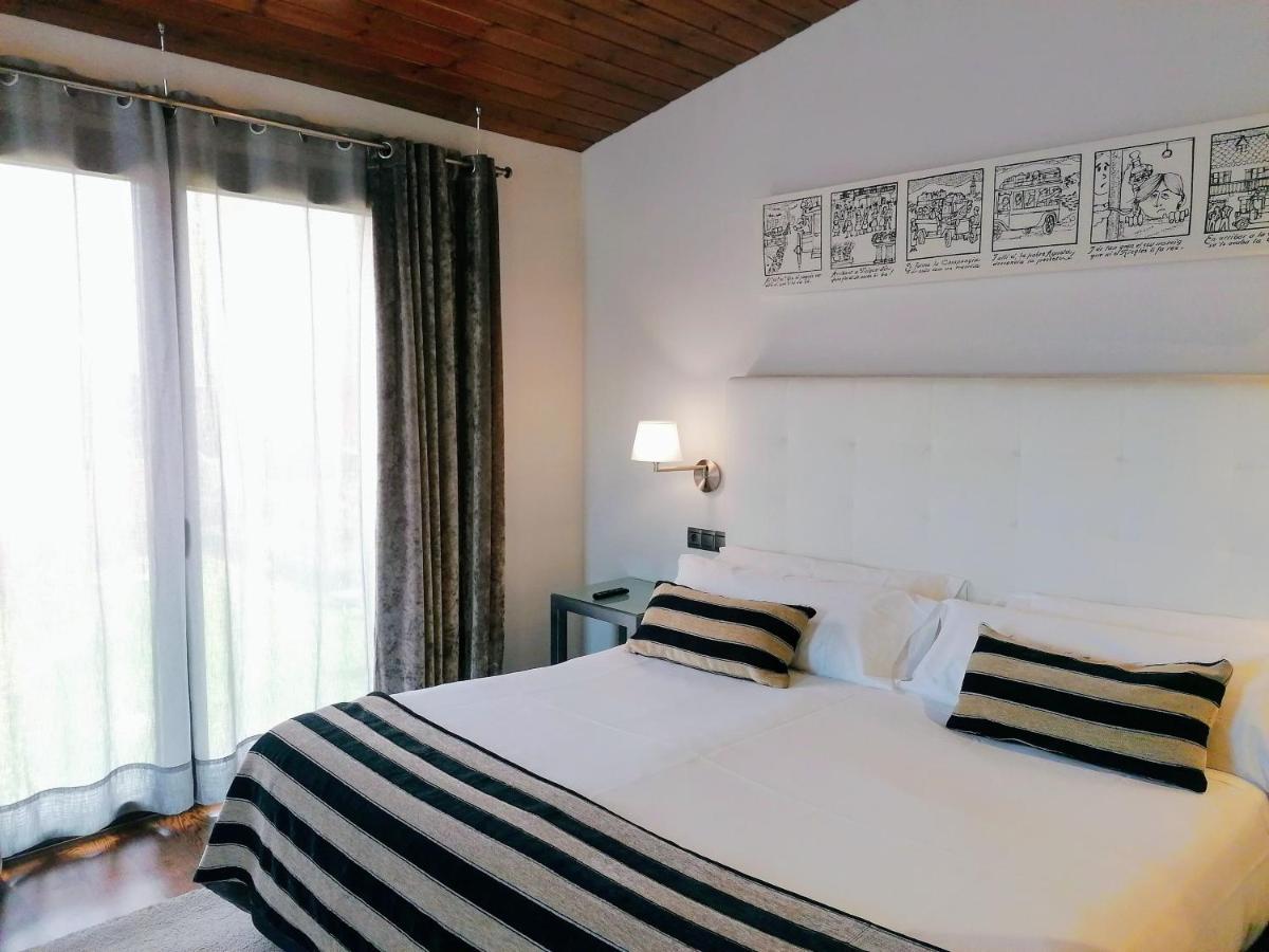 Cama o camas de una habitación en Hotel Villa Paulita