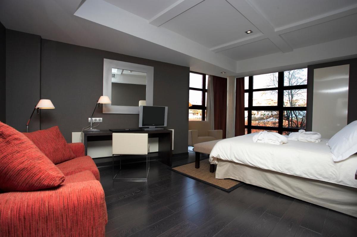 Cama o camas de una habitación en Hotel La Trufa Negra