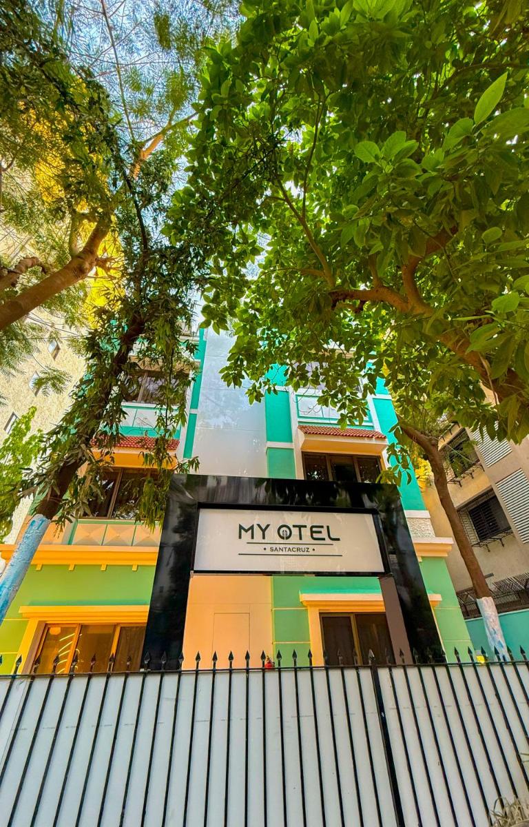 a building with a my office sign in front of it at MyOtel - Santacruz in Mumbai