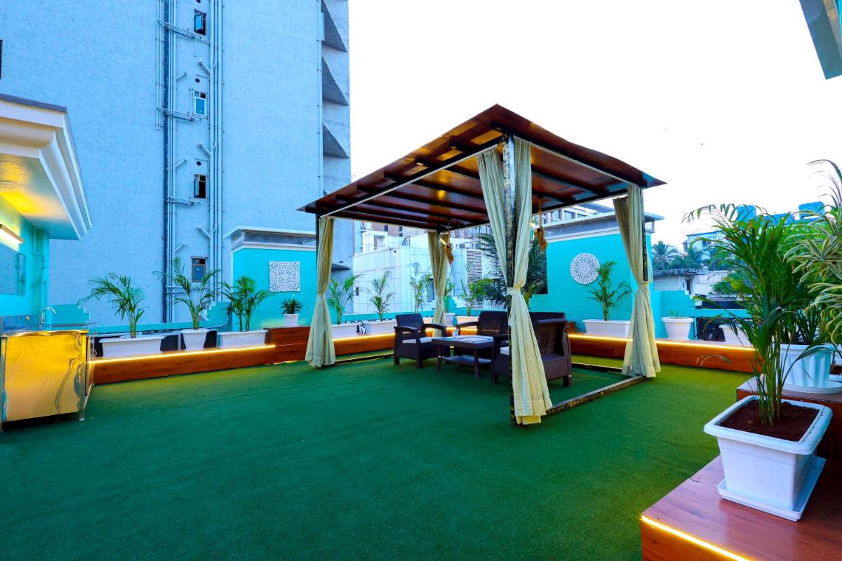 a room with a gazebo in a building at MyOtel - Santacruz in Mumbai