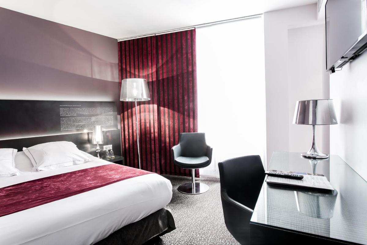 Un ou plusieurs lits dans un hébergement de l'établissement Chapeau Rouge par William Frachot - Hôtel Espace Bien-être & Restaurant étoilé