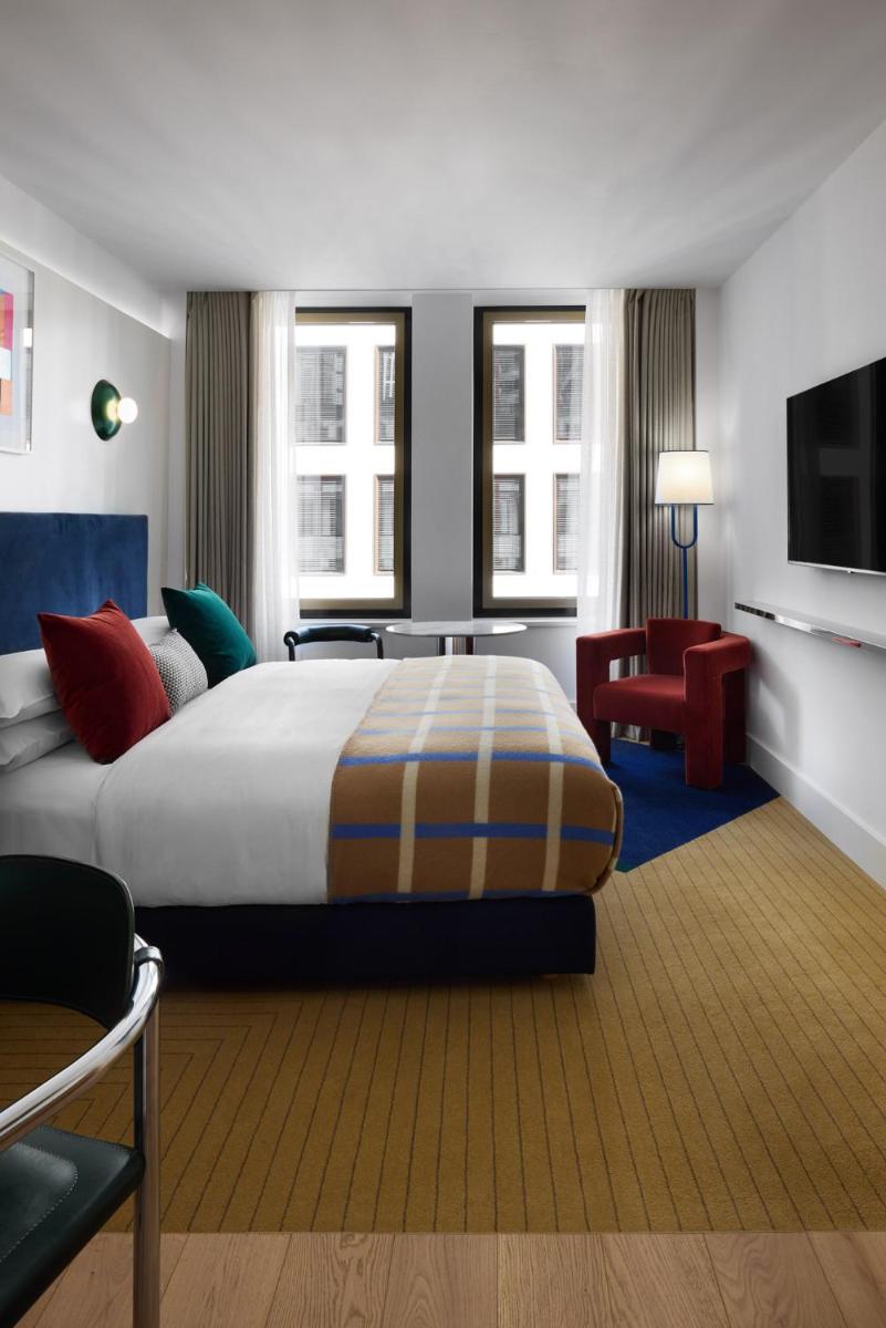 Ein Bett oder Betten in einem Zimmer der Unterkunft Kimpton Main Frankfurt by IHG