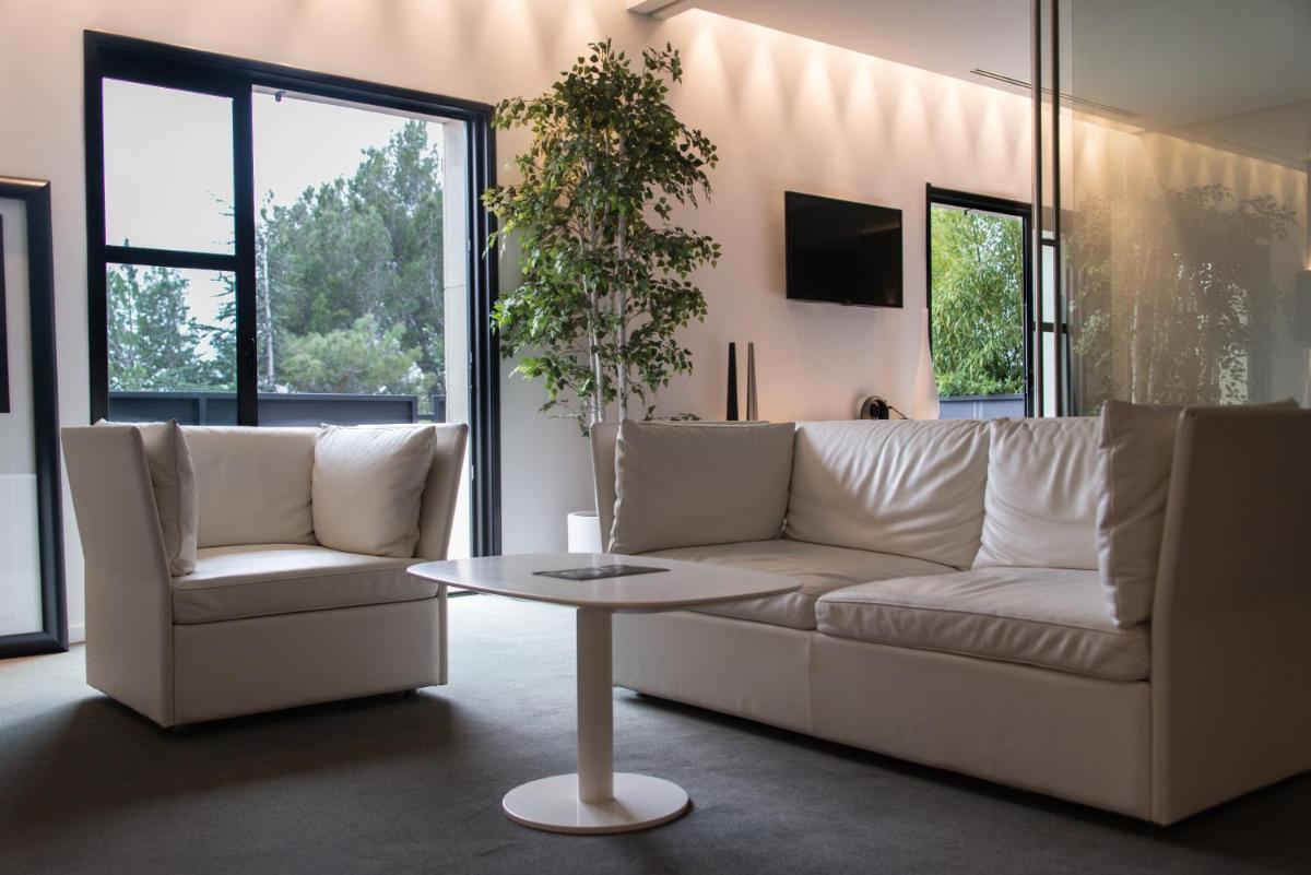 Coin salon dans l'établissement Bdesign & Spa