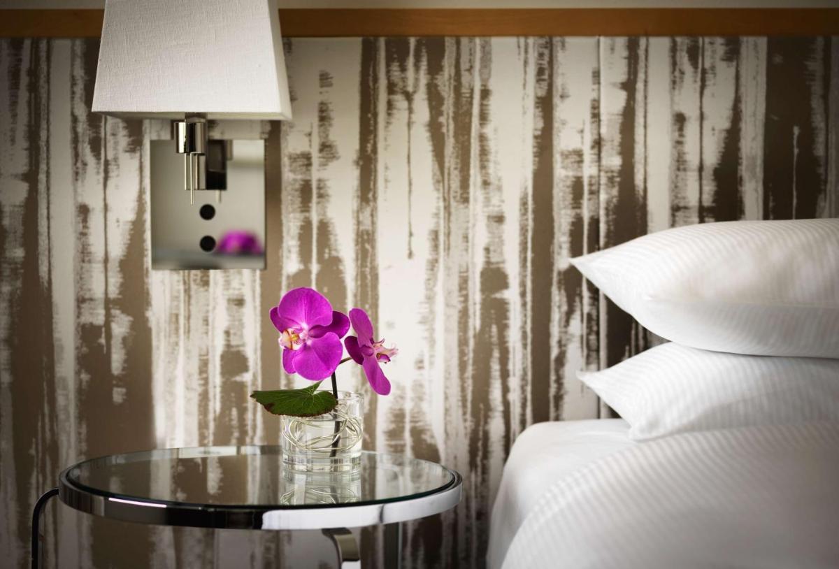 Ein Bett oder Betten in einem Zimmer der Unterkunft Hyatt Regency Mainz