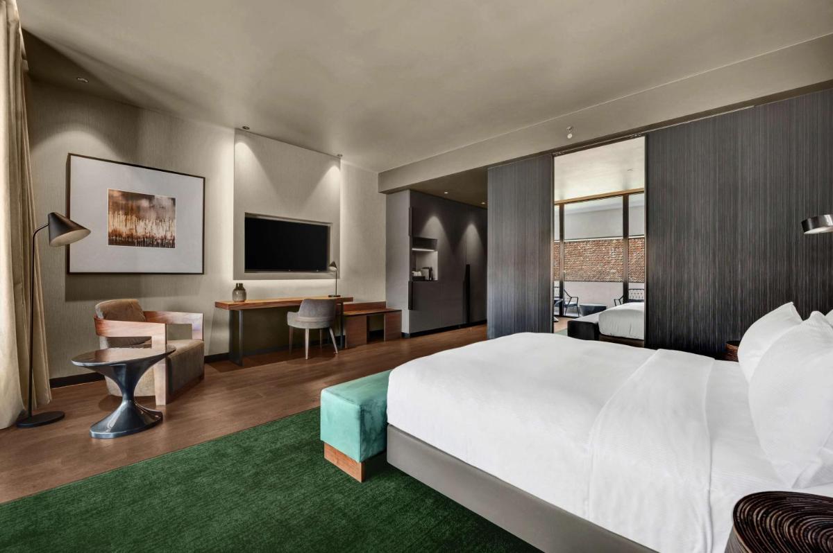 Uma cama ou camas num quarto em Hilton Porto Gaia