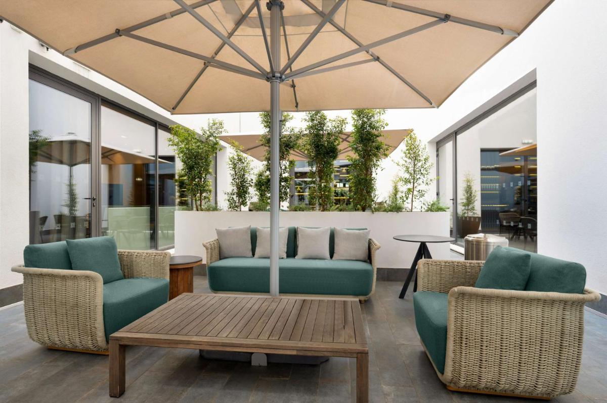 Uma área de estar em Hilton Porto Gaia