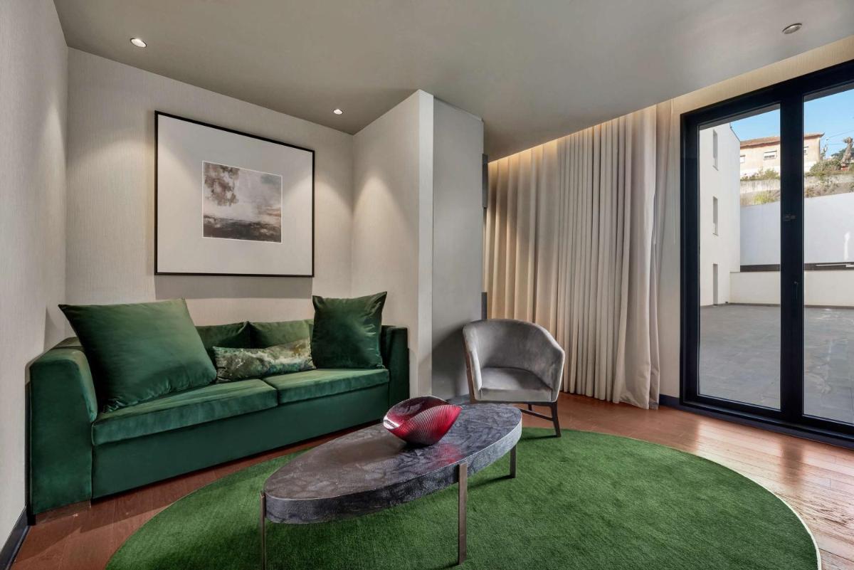Uma área de estar em Hilton Porto Gaia