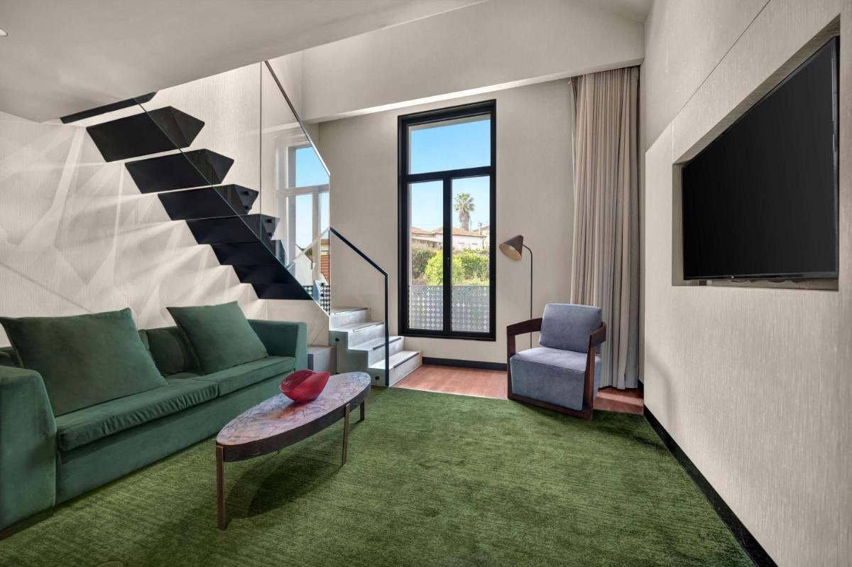 Uma área de estar em Hilton Porto Gaia