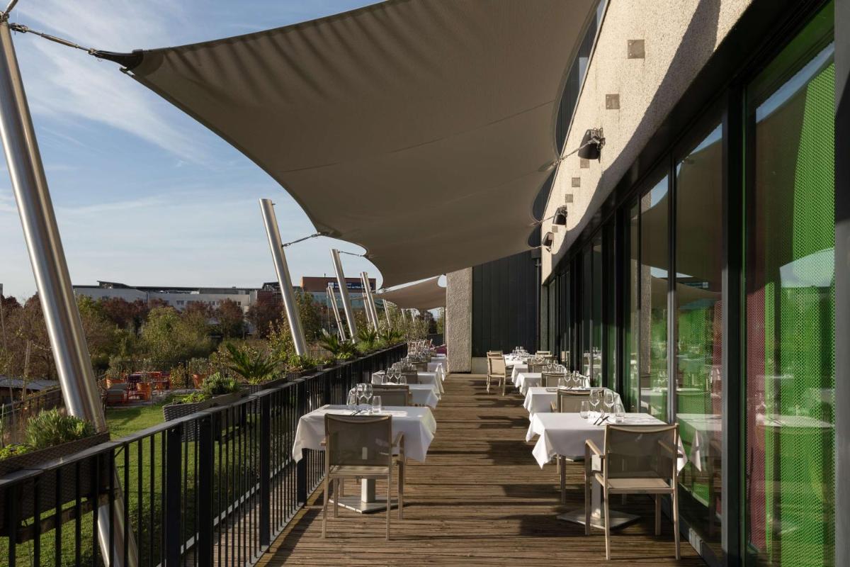 Balcon ou terrasse dans l'établissement DoubleTree by Hilton Lyon Eurexpo & Spa